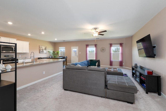 625 Aplite Pass, Maxwell, TX 78656 - living room featuring light colored carpet, ceiling fan, and recessed lighting