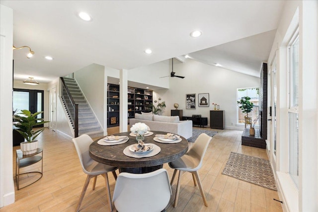 11308 Toledo Dr, Austin, TX 78759 - dining room featuring lofted ceiling, light wood-type flooring, stairway, ceiling fan, and recessed lighting