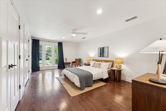 11308 Toledo Dr, Austin, TX 78759 - bedroom with dark wood-type flooring, ceiling fan, and recessed lighting