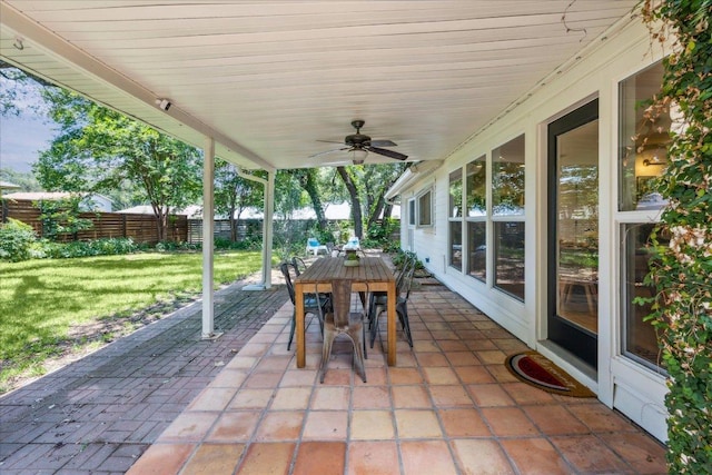 11308 Toledo Dr, Austin, TX 78759 - fenced backyard featuring outdoor dining area, a patio, and a ceiling fan