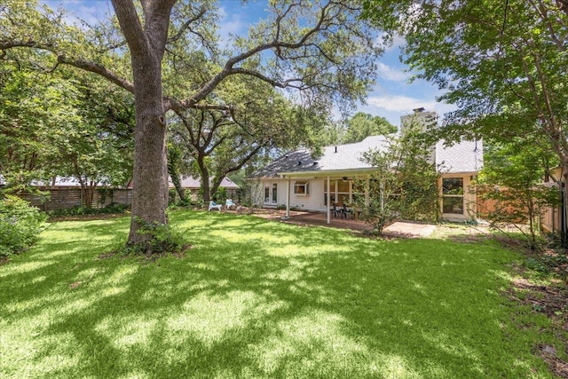 11308 Toledo Dr, Austin, TX 78759 - view of yard featuring a patio