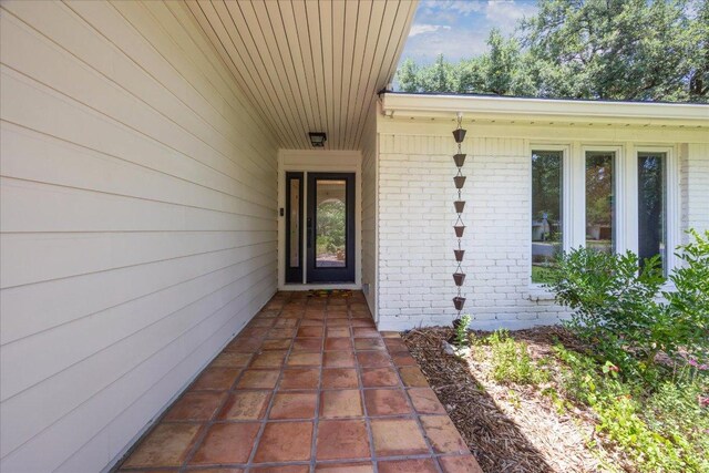 11308 Toledo Dr, Austin, TX 78759 - property entrance featuring brick siding