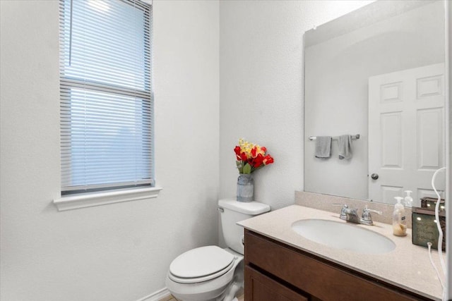 239 Crimson Ln, Kyle, TX 78640 - half bathroom featuring toilet and vanity