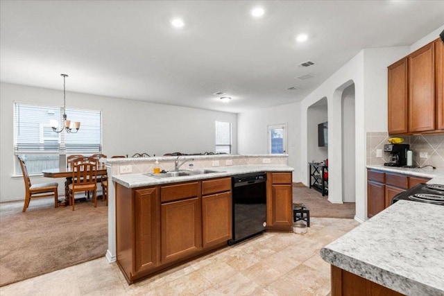 239 Crimson Ln, Kyle, TX 78640 - kitchen featuring black appliances, brown cabinetry, light carpet, light countertops, and recessed lighting