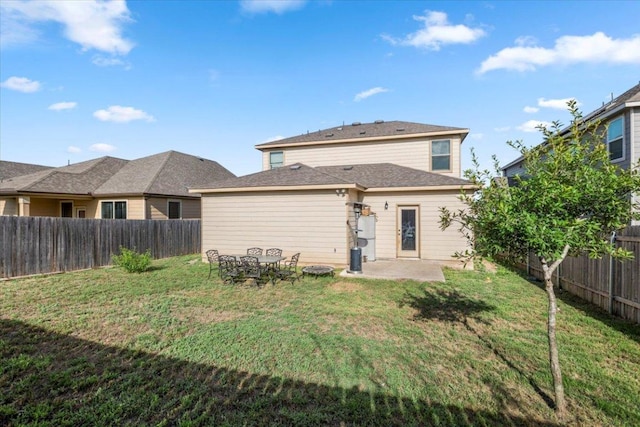 239 Crimson Ln, Kyle, TX 78640 - rear view of property with a fenced backyard and a patio area