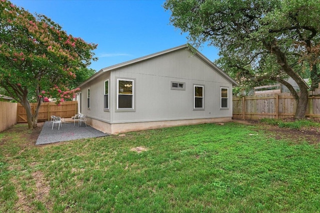 12806 Heinemann Dr, Austin, TX 78727 - rear view of house with a fenced backyard and a patio
