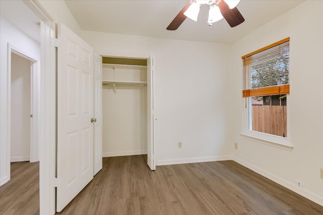 12806 Heinemann Dr, Austin, TX 78727 - unfurnished bedroom with wood finished floors, a closet, and a ceiling fan