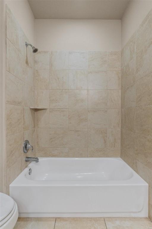 7901 Arbor Knoll Ct, Lago Vista, TX 78645 - bathroom featuring shower / bath combination and tile patterned flooring