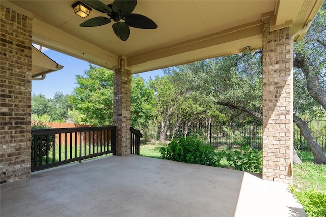 7901 Arbor Knoll Ct, Lago Vista, TX 78645 - view of patio / terrace with ceiling fan and view of wooded area