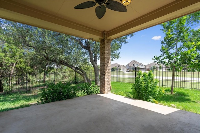 7901 Arbor Knoll Ct, Lago Vista, TX 78645 - fenced backyard featuring a ceiling fan, a patio area, and a residential view