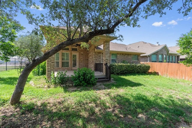 7901 Arbor Knoll Ct, Lago Vista, TX 78645 - back of property featuring brick siding