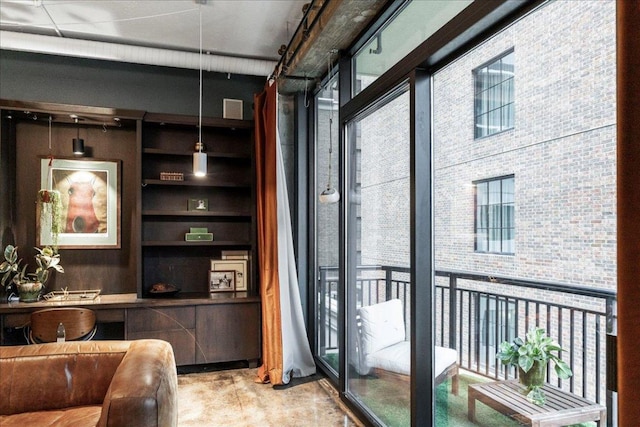 311 W 5th St Unit 1008, Austin, TX 78701 - office featuring built in shelves and concrete floors