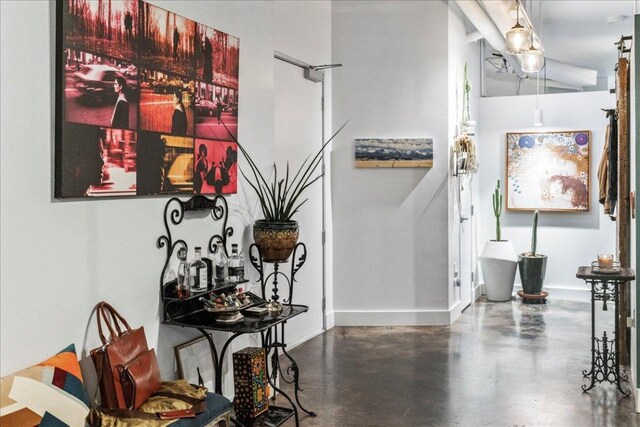 311 W 5th St Unit 1008, Austin, TX 78701 - hall with baseboards and finished concrete floors