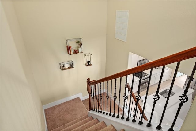 10913 Rock Island Dr Unit 55, Austin, TX 78717 - stairs featuring baseboards