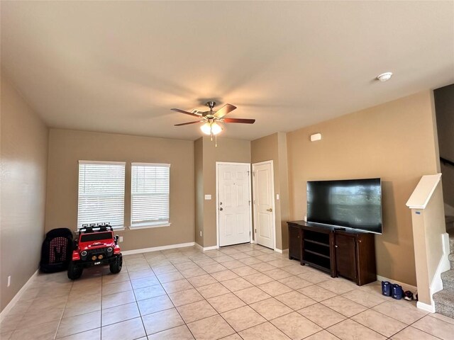 125 Duck Creek Trl, San Marcos, TX 78666 - living area with ceiling fan and light tile patterned floors