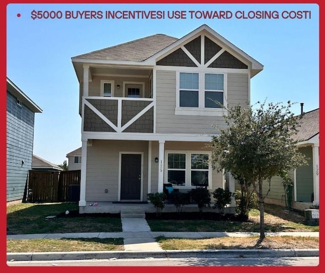 125 Duck Creek Trl, San Marcos, TX 78666 - view of front facade with covered porch and a balcony
