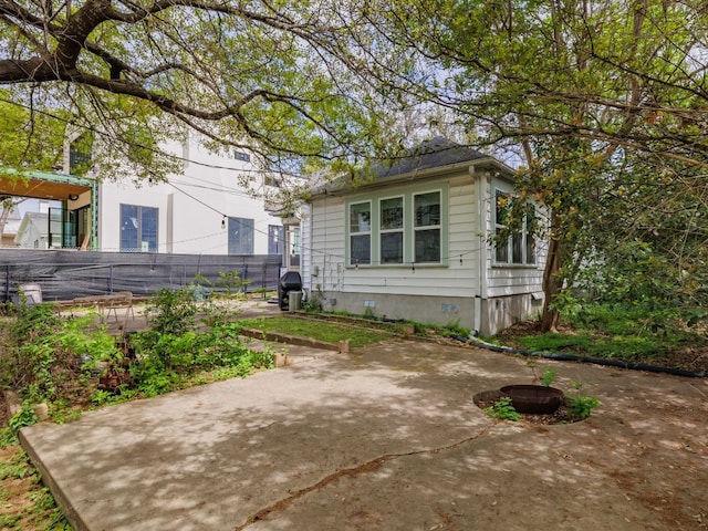 1508 Pease Rd, Austin, TX 78703 - view of home's exterior featuring a patio area and crawl space