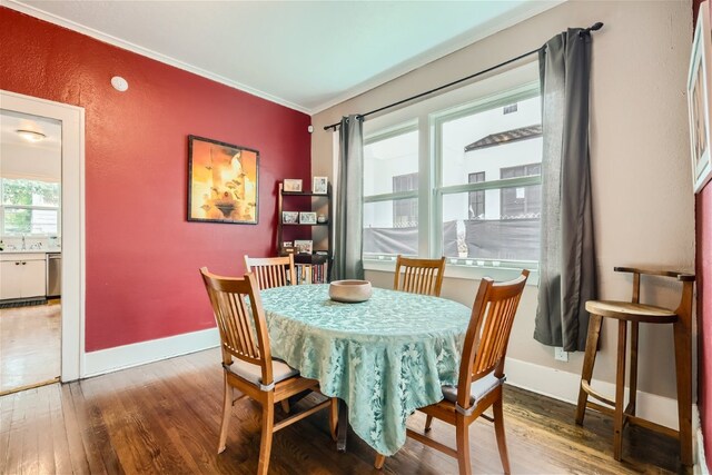 1508 Pease Rd, Austin, TX 78703 - dining room featuring wood finished floors and ornamental molding