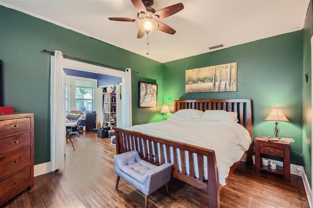1508 Pease Rd, Austin, TX 78703 - bedroom with wood finished floors and ceiling fan