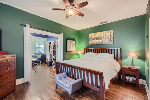 1508 Pease Rd, Austin, TX 78703 - bedroom featuring wood finished floors and a ceiling fan