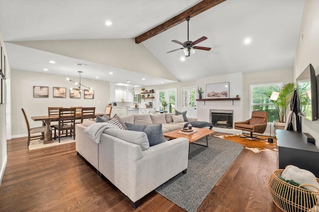 8714 Silverhill Ln, Austin, TX 78759 - living area with beam ceiling, a brick fireplace, high vaulted ceiling, dark wood-style flooring, and ceiling fan
