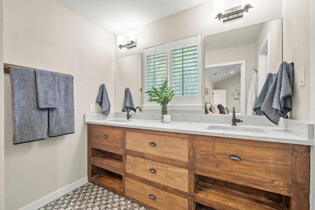 8714 Silverhill Ln, Austin, TX 78759 - full bath featuring double vanity and baseboards