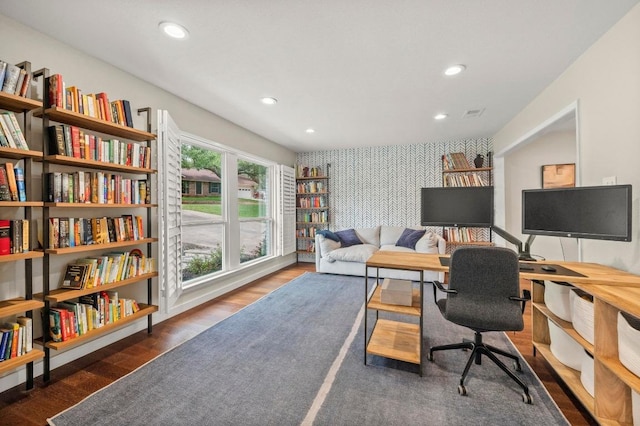 8714 Silverhill Ln, Austin, TX 78759 - office with wallpapered walls, recessed lighting, wood finished floors, and an accent wall