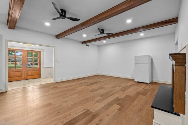 406 N Coronado Dr, Kerrville, TX 78028 - unfurnished living room featuring beam ceiling, a ceiling fan, light wood finished floors, recessed lighting, and french doors