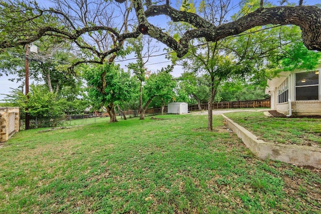 406 N Coronado Dr, Kerrville, TX 78028 - fenced backyard with a storage shed