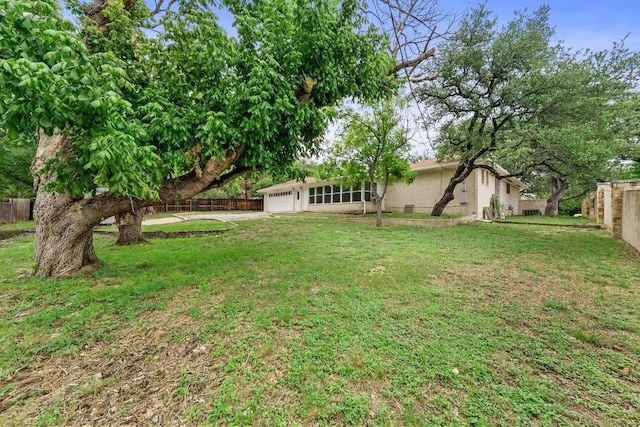 406 N Coronado Dr, Kerrville, TX 78028 - view of yard featuring a garage