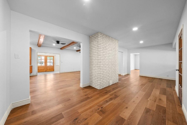406 N Coronado Dr, Kerrville, TX 78028 - unfurnished living room featuring beamed ceiling, wood finished floors, a ceiling fan, and recessed lighting