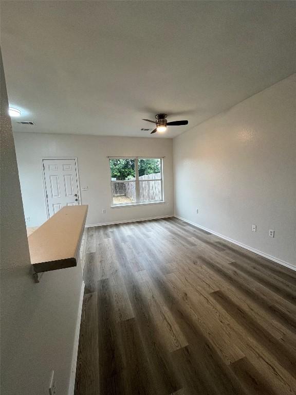 3016 Aftonshire Way, Austin, TX 78748 - spare room featuring ceiling fan and dark wood-style floors