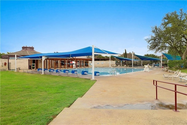 608 Cascada Ln, Round Rock, TX 78681 - community pool featuring a lawn