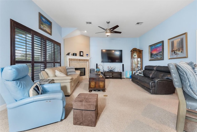 3516 Valley Mist Ct, Temple, TX 76502 - carpeted living room featuring a ceiling fan and a tile fireplace