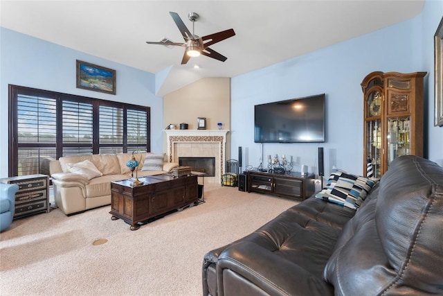 3516 Valley Mist Ct, Temple, TX 76502 - carpeted living room featuring ceiling fan, a tiled fireplace, and vaulted ceiling
