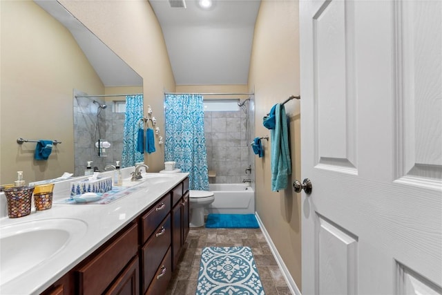 3516 Valley Mist Ct, Temple, TX 76502 - full bathroom featuring double vanity, shower / tub combo with curtain, and stone finish flooring
