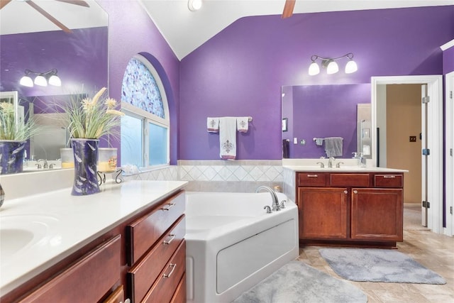 3516 Valley Mist Ct, Temple, TX 76502 - bathroom with double vanity, a bath, and high vaulted ceiling
