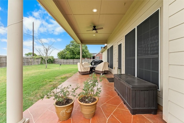 3516 Valley Mist Ct, Temple, TX 76502 - fenced backyard featuring a patio area, a ceiling fan, and grilling area