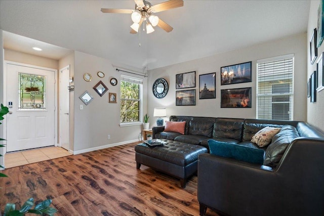 2321 Kale Dr, Austin, TX 78725 - living area with wood finished floors and ceiling fan
