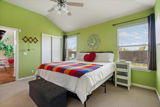 2321 Kale Dr, Austin, TX 78725 - bedroom with carpet, a closet, lofted ceiling, and a ceiling fan