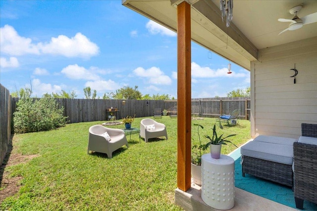 2321 Kale Dr, Austin, TX 78725 - fenced backyard featuring ceiling fan