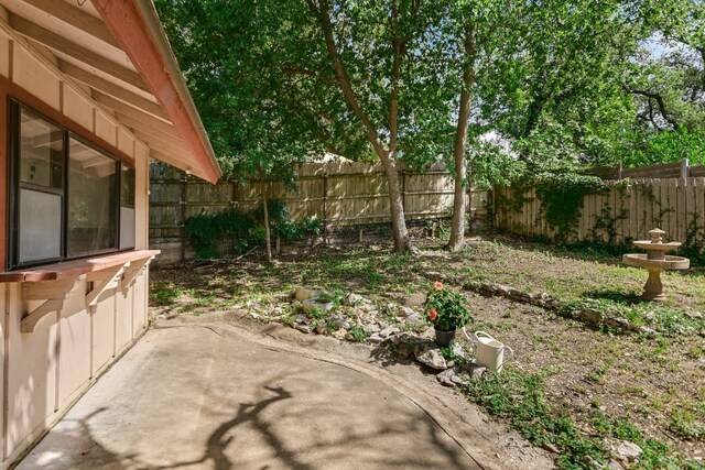 8702 Wildridge Dr, Austin, TX 78759 - fenced backyard with a patio