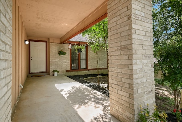 8702 Wildridge Dr, Austin, TX 78759 - property entrance featuring brick siding