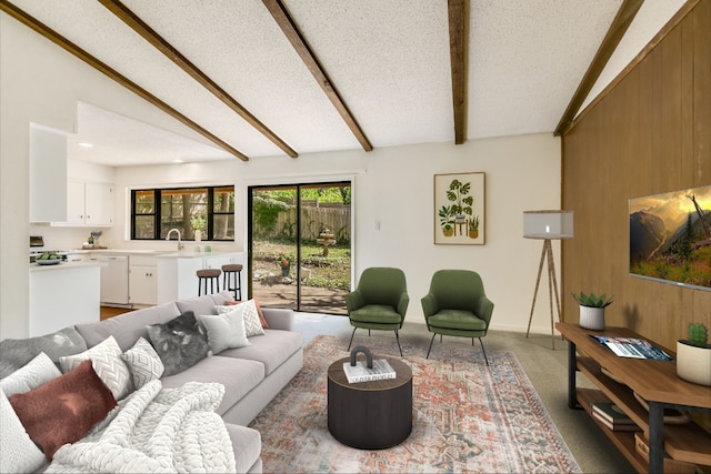 8702 Wildridge Dr, Austin, TX 78759 - living room featuring light carpet and wooden walls