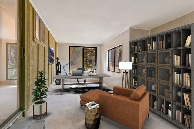 8702 Wildridge Dr, Austin, TX 78759 - living area with a desk, ornamental molding, and wooden walls