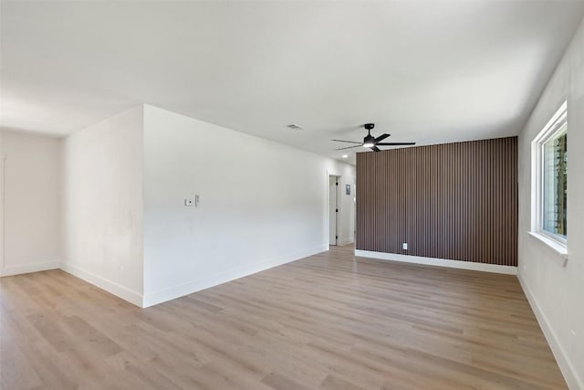 5603 Darlington Ln, Austin, TX 78723 - spare room with light wood-style floors and a ceiling fan