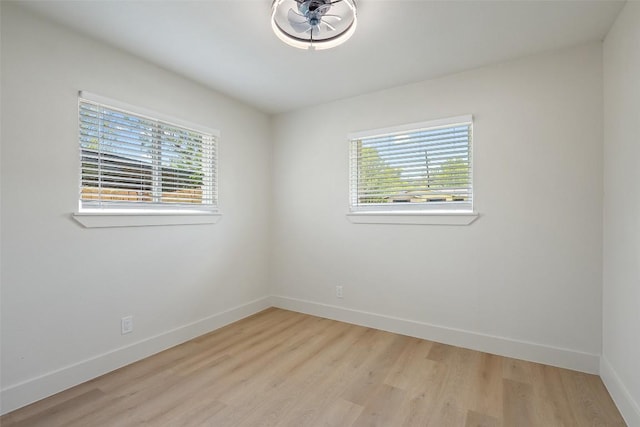 5603 Darlington Ln, Austin, TX 78723 - empty room featuring light wood-type flooring and baseboards
