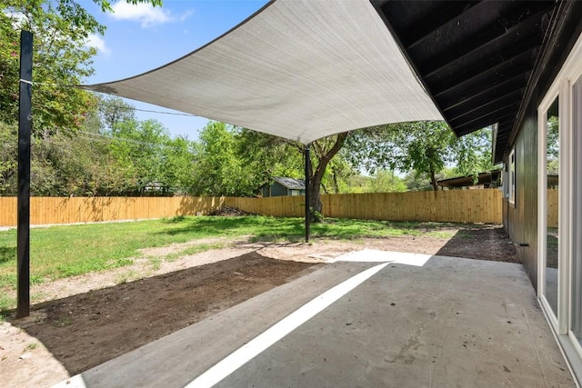 5603 Darlington Ln, Austin, TX 78723 - fenced backyard with a patio area