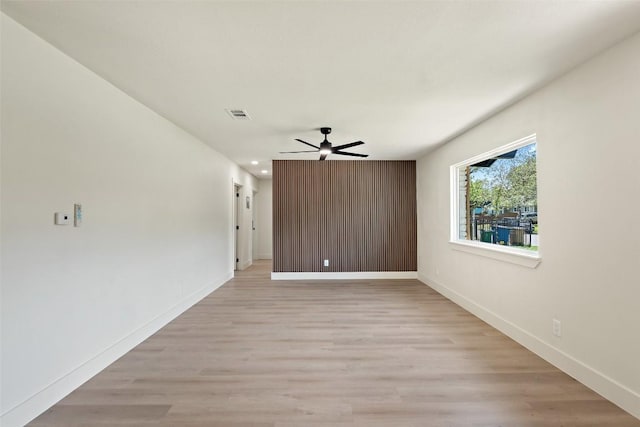 5603 Darlington Ln, Austin, TX 78723 - spare room with a ceiling fan, light wood-style flooring, and recessed lighting