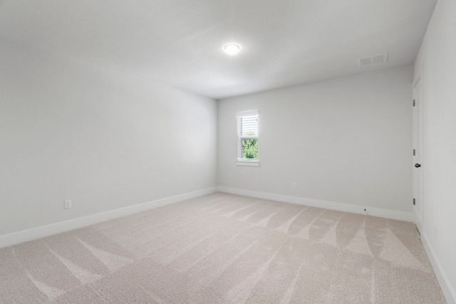265 Tierra Trl, Dripping Springs, TX 78620 - unfurnished room with light colored carpet and baseboards